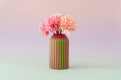 A hand painted green based ceramic vase with fuchsia stripes