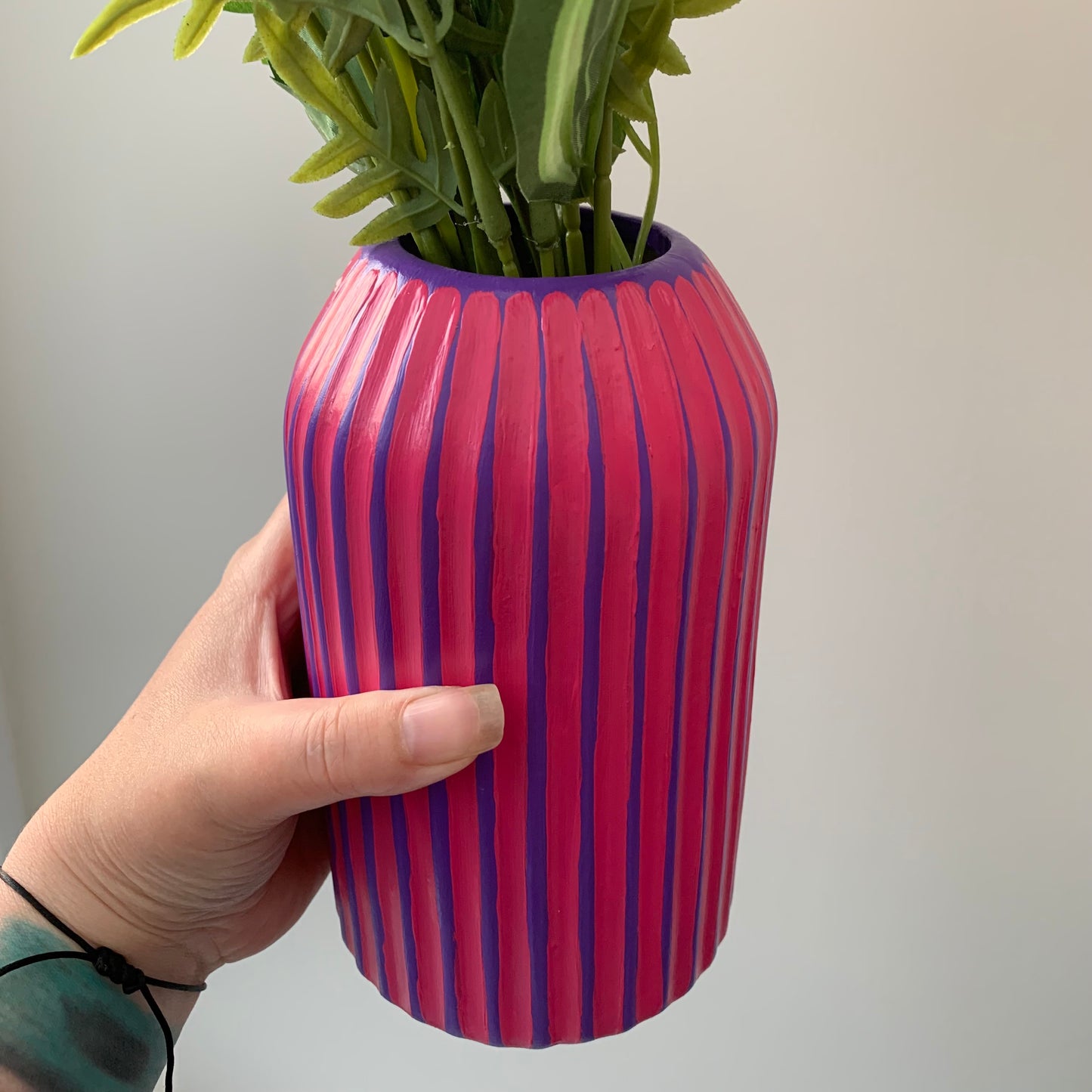 Purple and fuchsia hand painted striped ceramic vase